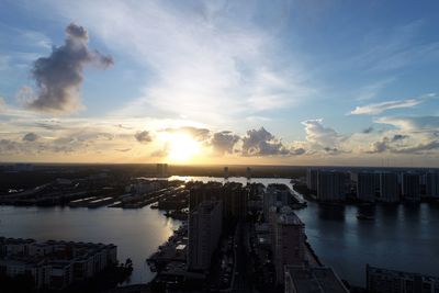 High angle view of bay against sky during sunset