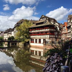 View of canal with buildings in background