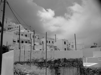 Low angle view of abandoned building against sky