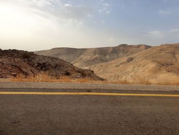 Scenic view of desert against sky