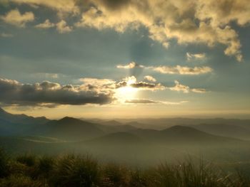 Scenic view of landscape against sky during sunset