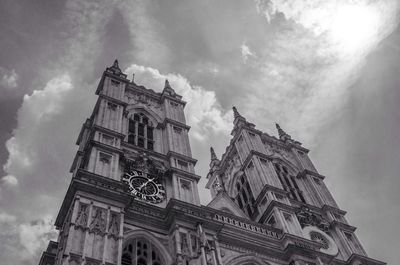 Low angle view of historic building against cloudy sky