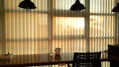 Shadow of lamp on table at home