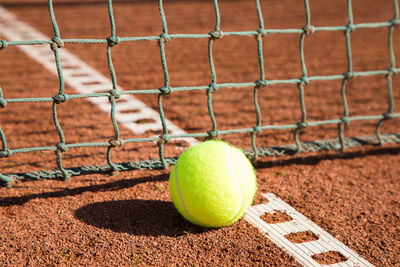 Close-up of fresh green ball on field