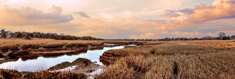 Sunset sky over the marsh and sesuit creek in east dennis in winter