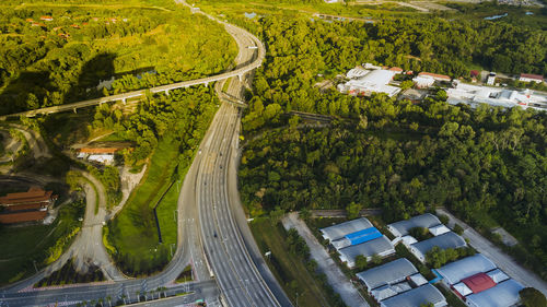 High angle view of road amidst buildings