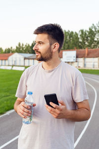 Young man using mobile phone