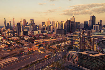 High angle view of modern buildings in city against sky