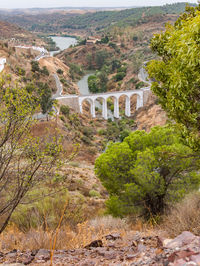 View of arch bridge over landscape