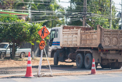 Road sign at construction site in city