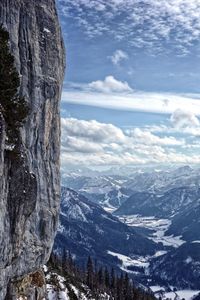 Scenic view of mountains against sky during winter