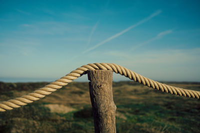 Close-up of rope against sky