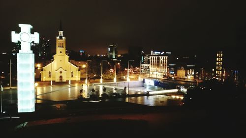 Illuminated cityscape at night