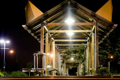 Low angle view of illuminated street light at night