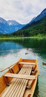 Idyllic panorama of a mountain lake with rowboat