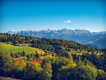 Scenic view of landscape against sky during autumn