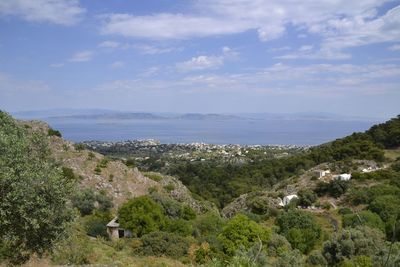 Scenic view of sea against cloudy sky