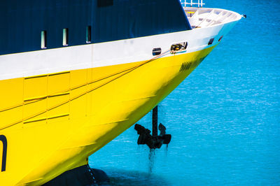 Close-up of anchor being lifted