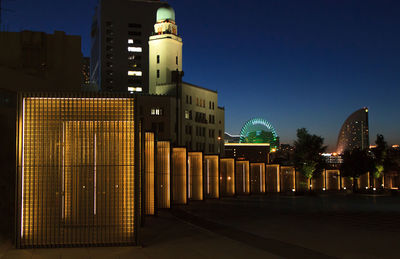 View of illuminated art installation in city at night