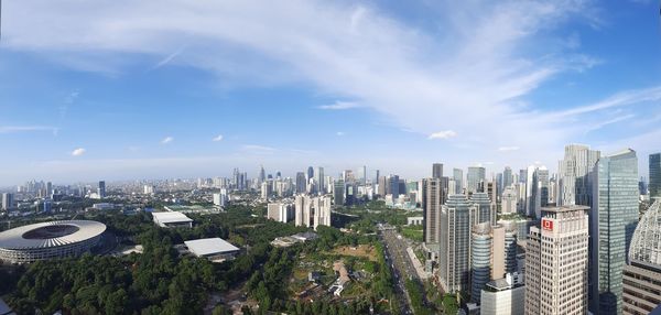 High angle view of buildings in city against sky