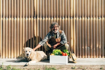 Side view of woman with dog