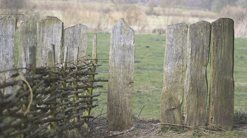 View of wooden fence on field