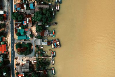 Aerial view of houses by sea
