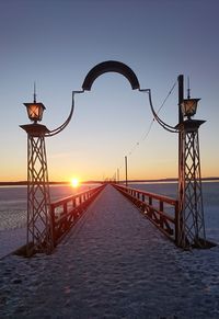 Scenic view of sea against clear sky during sunset