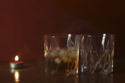 Close-up of whiskey in glass on table