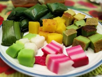 Close-up of multi colored fruits in plate