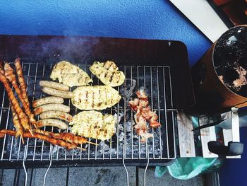 Close-up of meat on barbecue grill