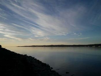 Scenic view of sea at sunset