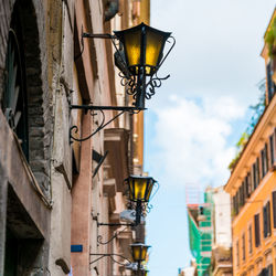 Low angle view of lamps on wall