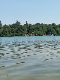 Scenic view of river against clear sky