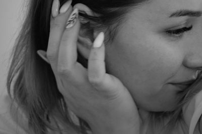 Close-up of young woman looking away