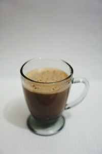 Close-up of coffee cup on table