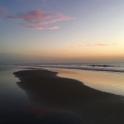 Scenic view of sea at sunset