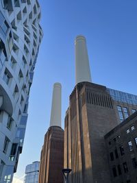 Low angle view of building against clear blue sky