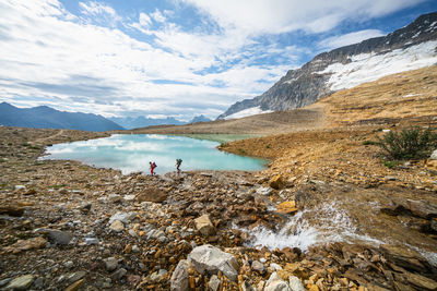 Two females exploring the iceline trail in yoho national park