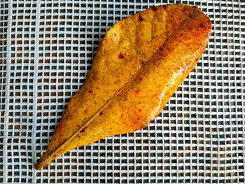 High angle view of yellow autumn leaf