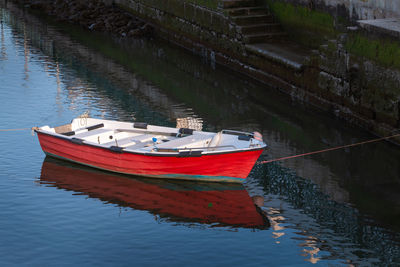 High angle view of fishing boats moored in lake