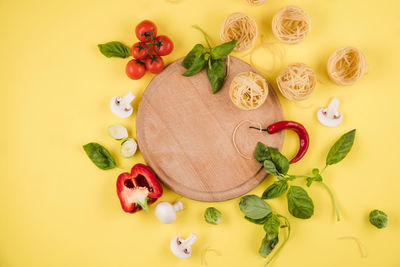 High angle view of fruits on cutting board