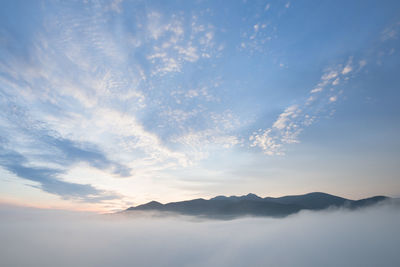 Scenic view of mountains against sky during sunset