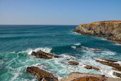 Scenic view of sea against clear sky