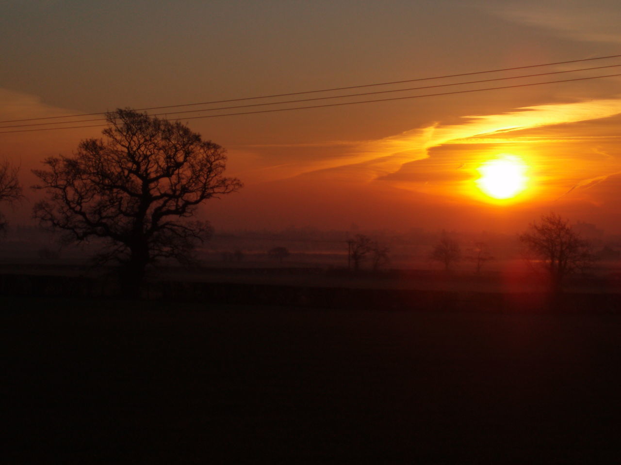 SCENIC VIEW OF SILHOUETTE LANDSCAPE AGAINST SKY DURING SUNSET