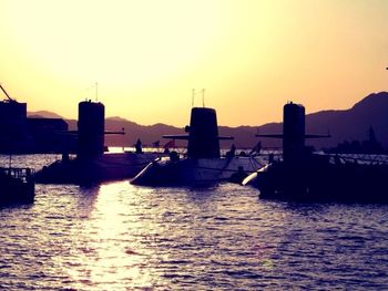 Scenic view of river at sunset