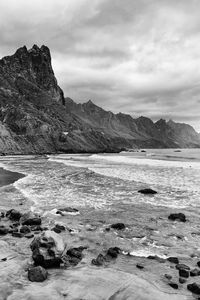 Scenic view of sea against cloudy sky