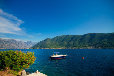 Scenic view of sea against blue sky