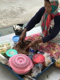 High angle view of man preparing food