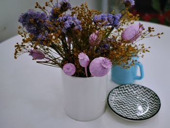 Close-up of flower vase on table